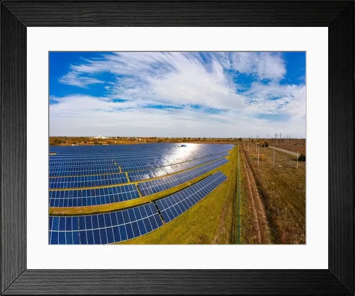 Framed Print : Huge solar power plant to use solar energy in a picturesque green field in Ukraine. Aerial panoramic drone shot Framed Print : Huge solar power plant to use solar energy in a picturesque green field in Ukraine. Aerial panoramic drone shot