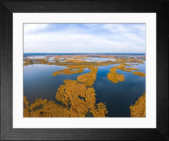Framed Print : Aerial view of the Samarskie Plavni on the Dnieper in Ukraine in the evening warm bright light Framed Print : Aerial view of the Samarskie Plavni on the Dnieper in Ukraine in the evening warm bright light