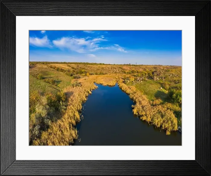 Framed Print : A stream flowing among huge stones covered with small dry plants in the warm evening light in picturesque Ukraine Framed Print : A stream flowing among huge stones covered with small dry plants in the warm evening light in picturesque Ukraine