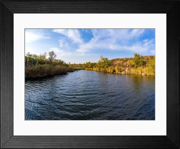 Framed Print : A stream flowing among huge stones covered with small dry plants in the warm evening light in picturesque Ukraine Framed Print : A stream flowing among huge stones covered with small dry plants in the warm evening light in picturesque Ukraine