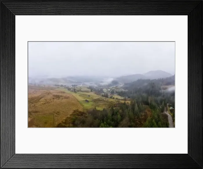 Framed Print : Rainy foggy and gray weather in the mountain valley of the Carpathians in Ukraine in small village Aerial panoramic Framed Print : Rainy foggy and gray weather in the mountain valley of the Carpathians in Ukraine in small village Aerial panoramic