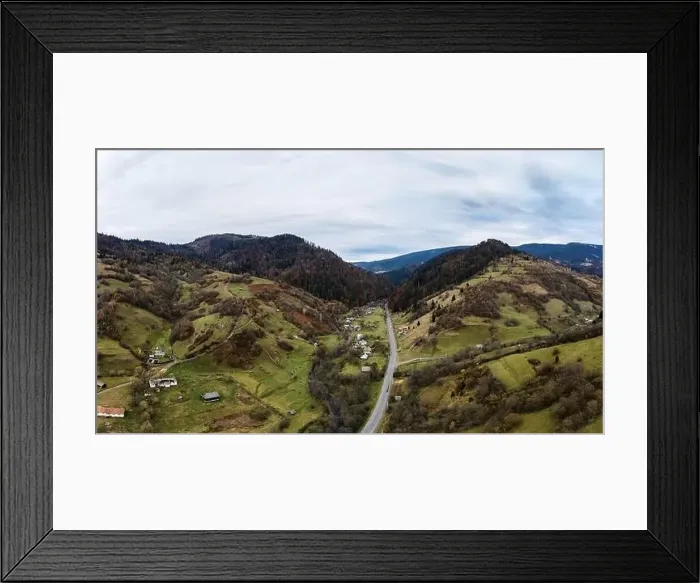 Framed Print : Small village in a mountain valley of the Carpathian Mountains on an autumn day in Ukraine along a road Framed Print : Small village in a mountain valley of the Carpathian Mountains on an autumn day in Ukraine along a road