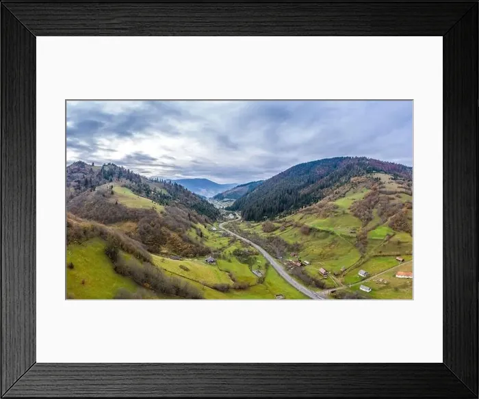 Framed Print : Sky with white and fluffy layer of clouds over green autumn hills, Aerial panoramic drone shot Framed Print : Sky with white and fluffy layer of clouds over green autumn hills, Aerial panoramic drone shot