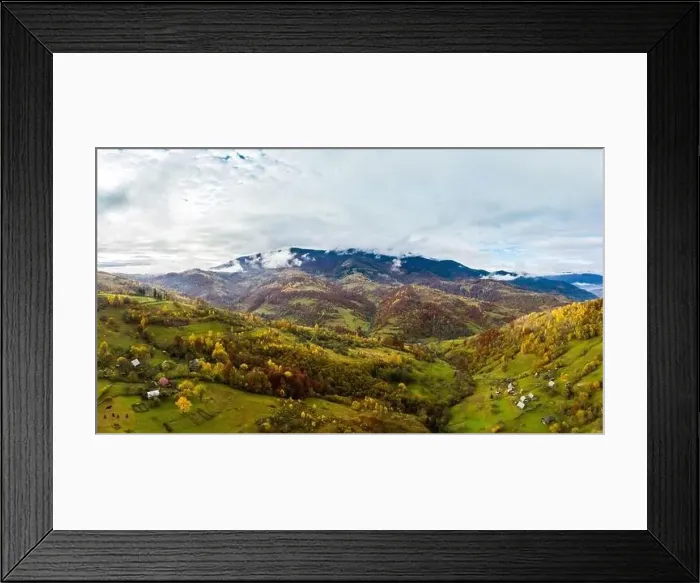 Framed Print : Sky with white and fluffy layer of clouds over green autumn hills, Aerial panoramic drone shot Framed Print : Sky with white and fluffy layer of clouds over green autumn hills, Aerial panoramic drone shot