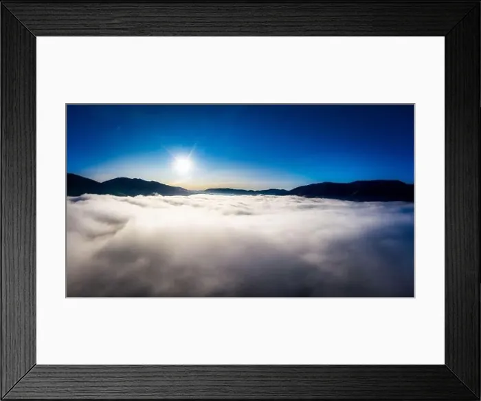 Framed Print : Sunrise over mountain hils covered with gray mist. Aerial panoramic drone shot Framed Print : Sunrise over mountain hils covered with gray mist. Aerial panoramic drone shot