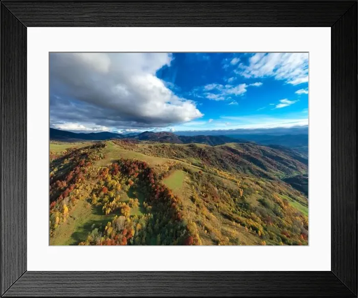 Framed Print : Sky with white and fluffy layer of clouds over green autumn hills, Aerial panoramic drone shot Framed Print : Sky with white and fluffy layer of clouds over green autumn hills, Aerial panoramic drone shot