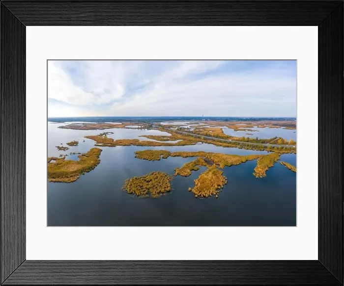 Framed Print : Aerial view of the Samarskie Plavni on the Dnieper in Ukraine in the evening warm bright light Framed Print : Aerial view of the Samarskie Plavni on the Dnieper in Ukraine in the evening warm bright light