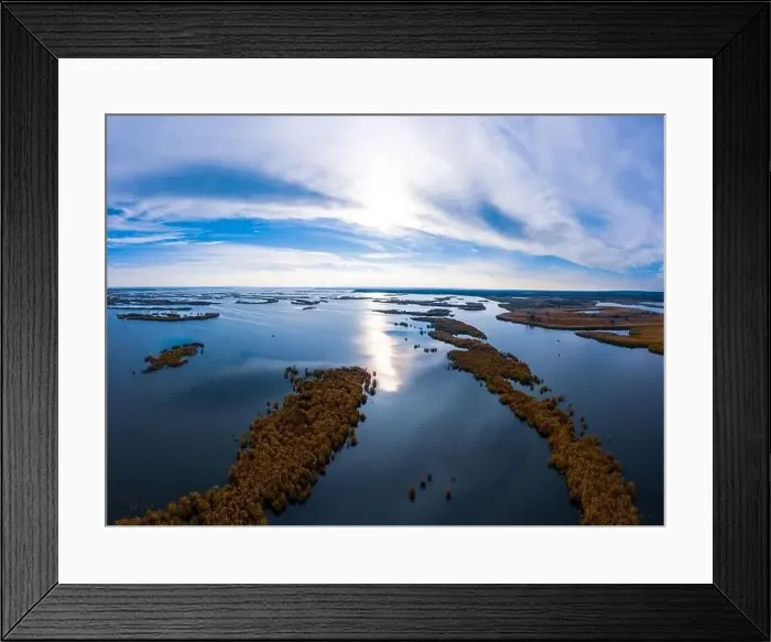 Framed Print : Bird's-eye view of the beautiful Samarskie Plavni in the warm evening light in Ukraine. Aerial panoramic drone shot Framed Print : Bird's-eye view of the beautiful Samarskie Plavni in the warm evening light in Ukraine. Aerial panoramic drone shot