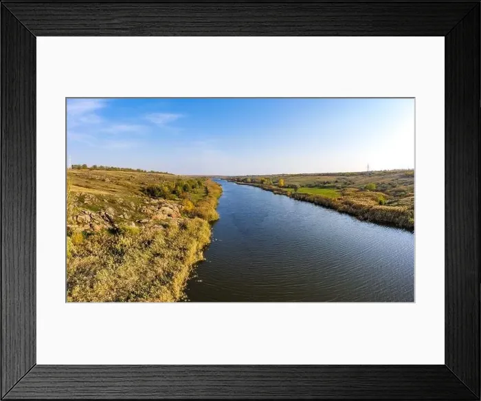 Framed Print : A stream flowing among huge stones covered with small dry plants in the warm evening light in picturesque Ukraine Framed Print : A stream flowing among huge stones covered with small dry plants in the warm evening light in picturesque Ukraine