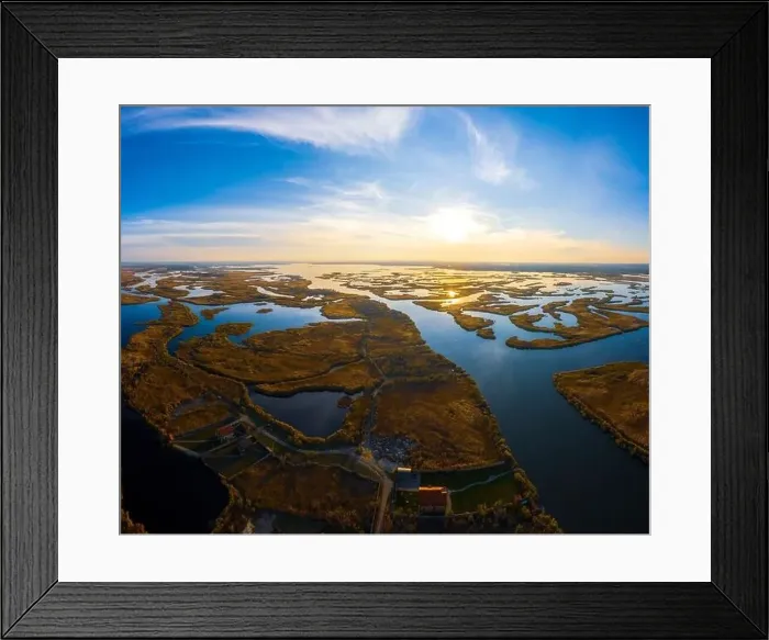 Framed Print : Top view of the beautiful Samarskie Plavni on the Dnieper with a village nearby in the warm evening light Framed Print : Top view of the beautiful Samarskie Plavni on the Dnieper with a village nearby in the warm evening light