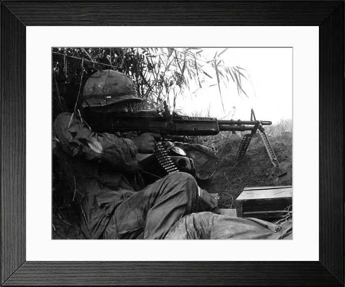 Framed Print : Vietnam: US Army Sergeant Gerald Laird of the 101st Airborne Division firing a machine gun during an engagement in Framed Print : Vietnam: US Army Sergeant Gerald Laird of the 101st Airborne Division firing a machine gun during an engagement in