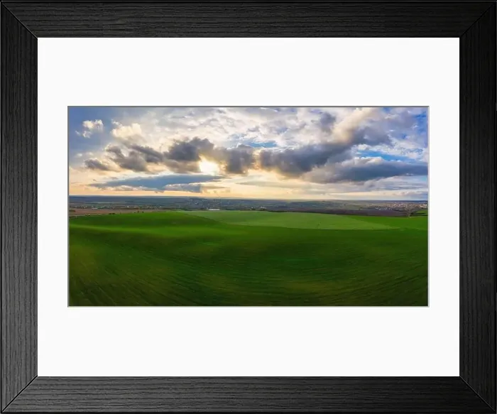 Framed Print : Flying over a field of growing wheat. Aerial panoramic drone shot Framed Print : Flying over a field of growing wheat. Aerial panoramic drone shot
