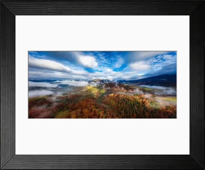 Framed Print : Sky with white and fluffy layer of clouds over green autumn hills, Aerial panoramic drone shot Framed Print : Sky with white and fluffy layer of clouds over green autumn hills, Aerial panoramic drone shot