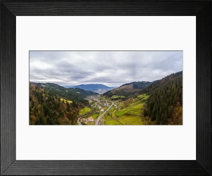 Framed Print : Small village in a mountain valley of the Carpathian Mountains on an autumn day in Ukraine along a road Framed Print : Small village in a mountain valley of the Carpathian Mountains on an autumn day in Ukraine along a road