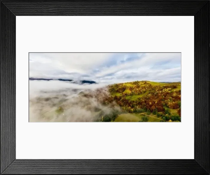 Framed Print : Sky with white and fluffy layer of clouds over green autumn hills, Aerial panoramic drone shot Framed Print : Sky with white and fluffy layer of clouds over green autumn hills, Aerial panoramic drone shot