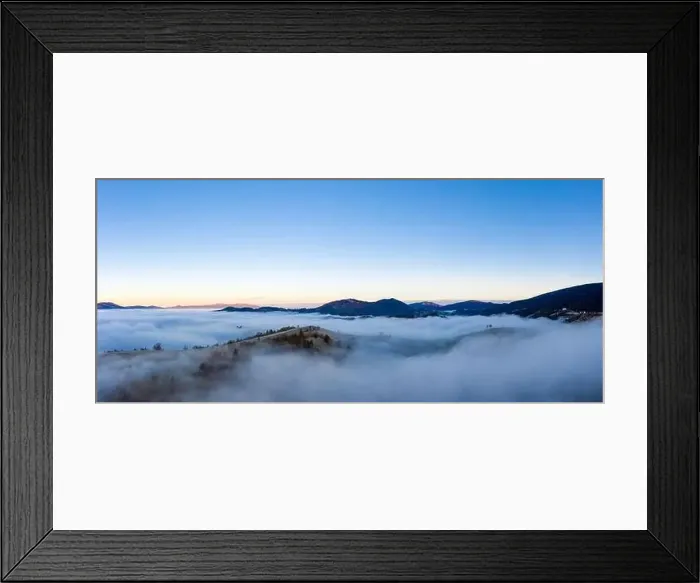 Framed Print : Sunrise over mountain hils covered with gray mist. Aerial panoramic drone shot Framed Print : Sunrise over mountain hils covered with gray mist. Aerial panoramic drone shot