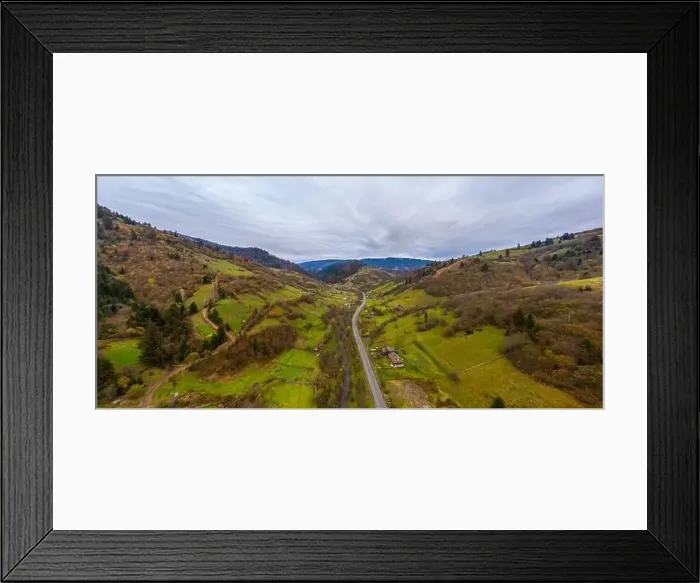 Framed Print : Small village in a mountain valley of the Carpathian Mountains on an autumn day in Ukraine along a road Framed Print : Small village in a mountain valley of the Carpathian Mountains on an autumn day in Ukraine along a road