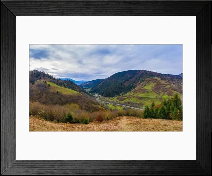 Framed Print : Sky with white and fluffy layer of clouds over green autumn hills, Aerial panoramic drone shot Framed Print : Sky with white and fluffy layer of clouds over green autumn hills, Aerial panoramic drone shot