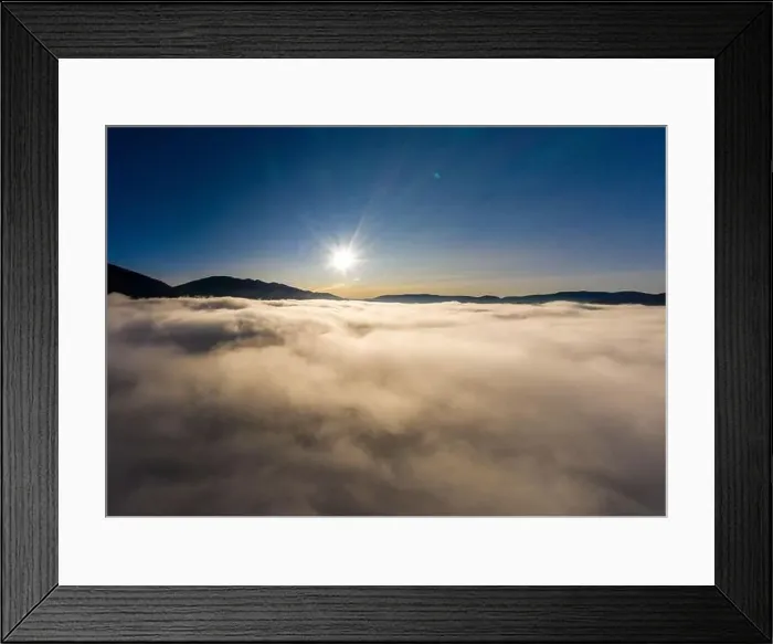 Framed Print : Sunrise over mountain hils covered with gray mist. Aerial panoramic drone shot Framed Print : Sunrise over mountain hils covered with gray mist. Aerial panoramic drone shot