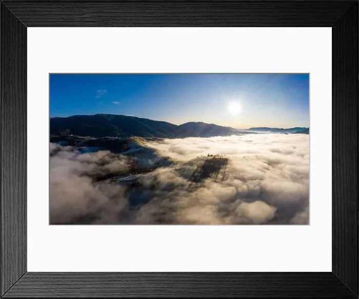 Framed Print : Sunrise over mountain hils covered with gray mist. Aerial panoramic drone shot Framed Print : Sunrise over mountain hils covered with gray mist. Aerial panoramic drone shot