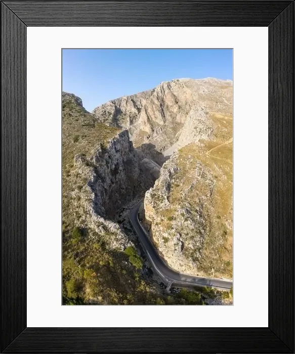Framed Print : Aerial view of road leading into Kourtaliotiko Gorge, Crete, Greece Framed Print : Aerial view of road leading into Kourtaliotiko Gorge, Crete, Greece