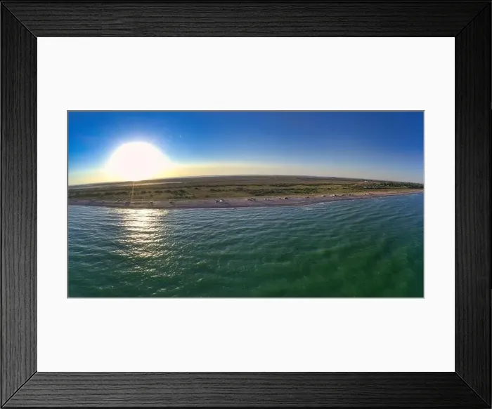 Framed Print : The edge of the sea in the evening sun. Camping beach. Drone shot 4K Framed Print : The edge of the sea in the evening sun. Camping beach. Drone shot 4K
