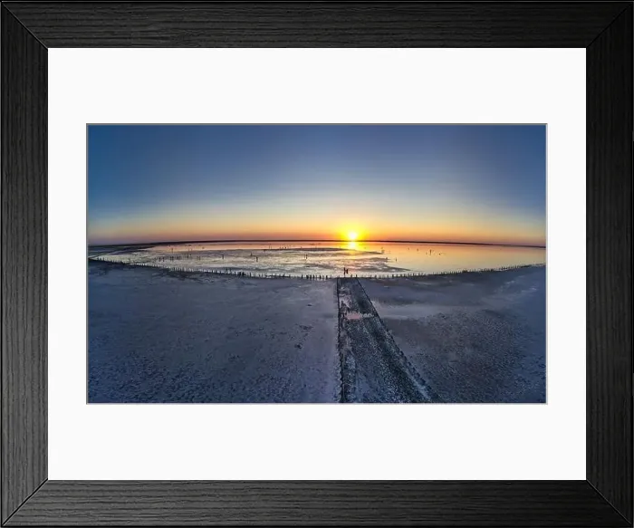Framed Print : Top view of a shiny salty pink lake and a path along it Framed Print : Top view of a shiny salty pink lake and a path along it