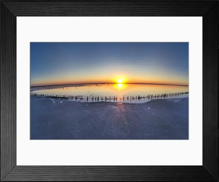 Framed Print : Top view of a shiny salty pink lake and a path along it Framed Print : Top view of a shiny salty pink lake and a path along it