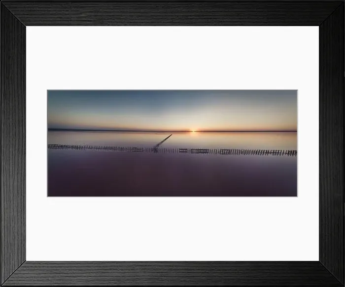 Framed Print : Top view of a shiny salty pink lake and a path along it Framed Print : Top view of a shiny salty pink lake and a path along it