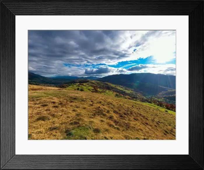 Framed Print : Sky with white and fluffy layer of clouds over green autumn hills, Aerial panoramic drone shot Framed Print : Sky with white and fluffy layer of clouds over green autumn hills, Aerial panoramic drone shot