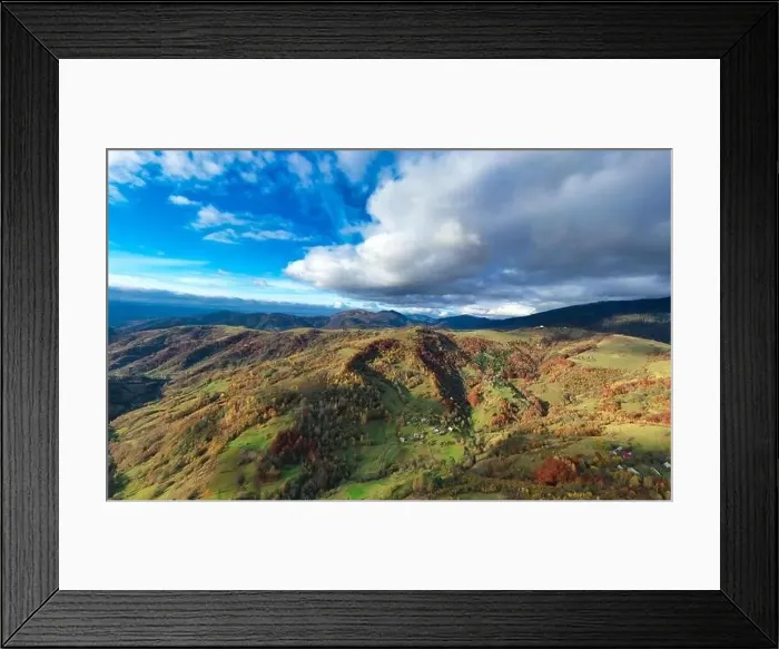 Framed Print : Sky with white and fluffy layer of clouds over green autumn hills, Aerial panoramic drone shot Framed Print : Sky with white and fluffy layer of clouds over green autumn hills, Aerial panoramic drone shot