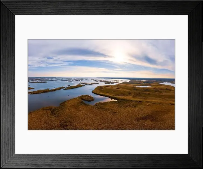 Framed Print : Bird's-eye view of the beautiful Samarskie Plavni in the warm evening light in Ukraine. Aerial panoramic drone shot Framed Print : Bird's-eye view of the beautiful Samarskie Plavni in the warm evening light in Ukraine. Aerial panoramic drone shot