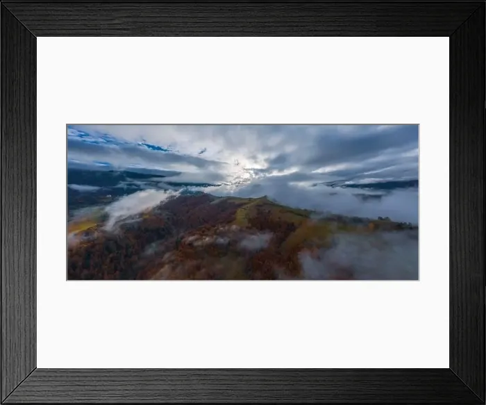 Framed Print : Autumn flight through blue sky in Carpatian autumn mountains, Aerial panoramic drone shot Framed Print : Autumn flight through blue sky in Carpatian autumn mountains, Aerial panoramic drone shot