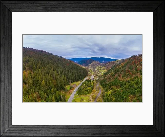 Framed Print : Small village in a mountain valley of the Carpathian Mountains on an autumn day in Ukraine along a road Framed Print : Small village in a mountain valley of the Carpathian Mountains on an autumn day in Ukraine along a road