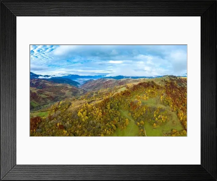 Framed Print : Sky with white and fluffy layer of clouds over green autumn hills, Aerial panoramic drone shot Framed Print : Sky with white and fluffy layer of clouds over green autumn hills, Aerial panoramic drone shot
