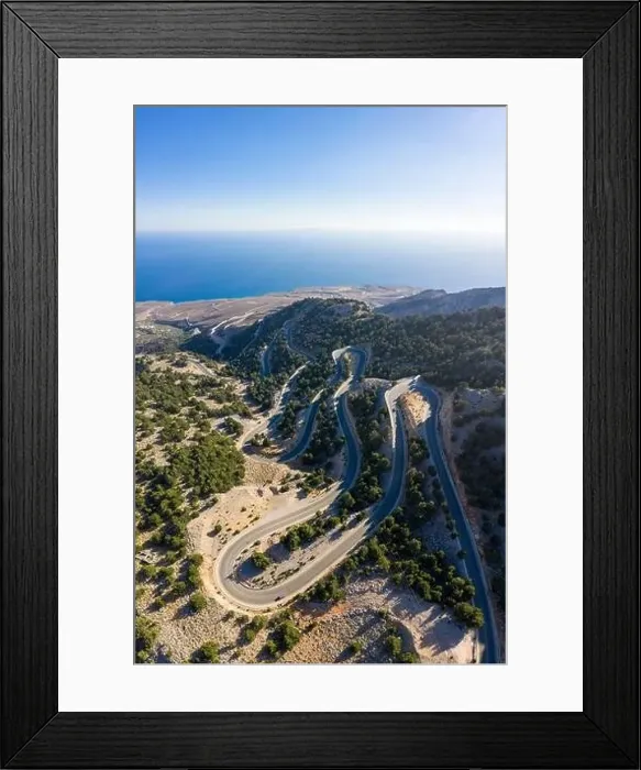 Framed Print : Aerial view of the winding road to the town of Hora Skafion on the south coast of Crete, Greece Framed Print : Aerial view of the winding road to the town of Hora Skafion on the south coast of Crete, Greece