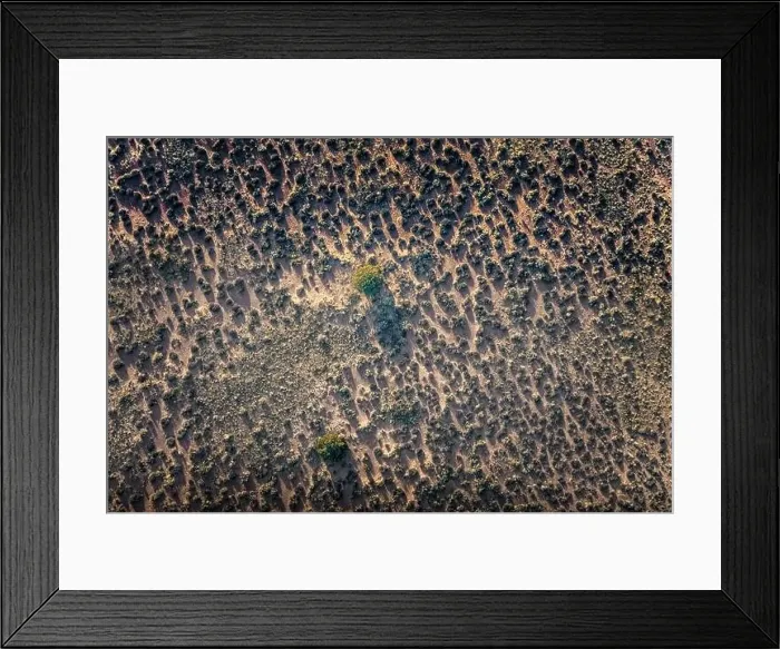 Framed Print : Aerial view on a wilderness area with sand and bushes close to Moab, Utah Framed Print : Aerial view on a wilderness area with sand and bushes close to Moab, Utah