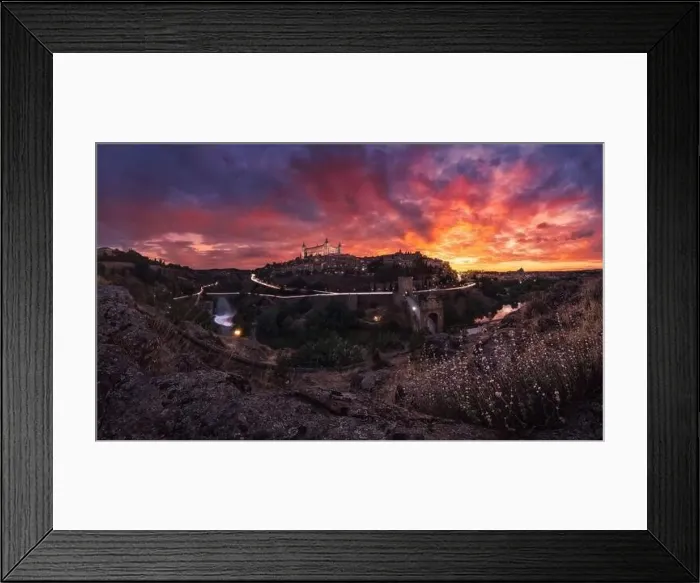 Framed Print : Amazing drone view of aged town with old buildings glowing during sunset and luminous highway in long exposure Framed Print : Amazing drone view of aged town with old buildings glowing during sunset and luminous highway in long exposure