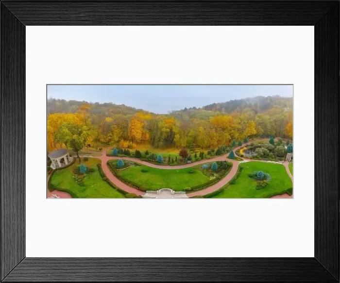 Framed Print : The meadow is surrounded by yellow and green trees, autumn landscape. Drone view Framed Print : The meadow is surrounded by yellow and green trees, autumn landscape. Drone view