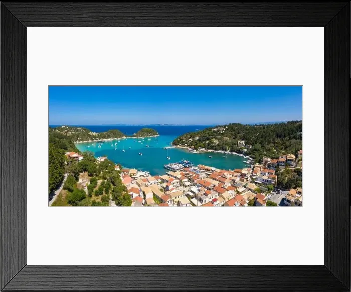 Framed Print : Aerial coastal view of the village of Lakka on the north coast of Paxos, Ionian Islands, Greece Framed Print : Aerial coastal view of the village of Lakka on the north coast of Paxos, Ionian Islands, Greece