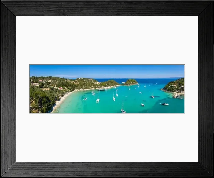 Framed Print : Aerial view of Paralia Lakka beach near the seaside village of Lakka on the north coast of Paxos, Ionian Islands, Greece Framed Print : Aerial view of Paralia Lakka beach near the seaside village of Lakka on the north coast of Paxos, Ionian Islands, Greece