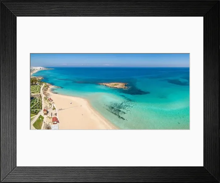 Framed Print : Aerial panoramic coastal view of Fig Tree Beach - a popular tourist attraction in Ayia Napa, Cyprus Framed Print : Aerial panoramic coastal view of Fig Tree Beach - a popular tourist attraction in Ayia Napa, Cyprus