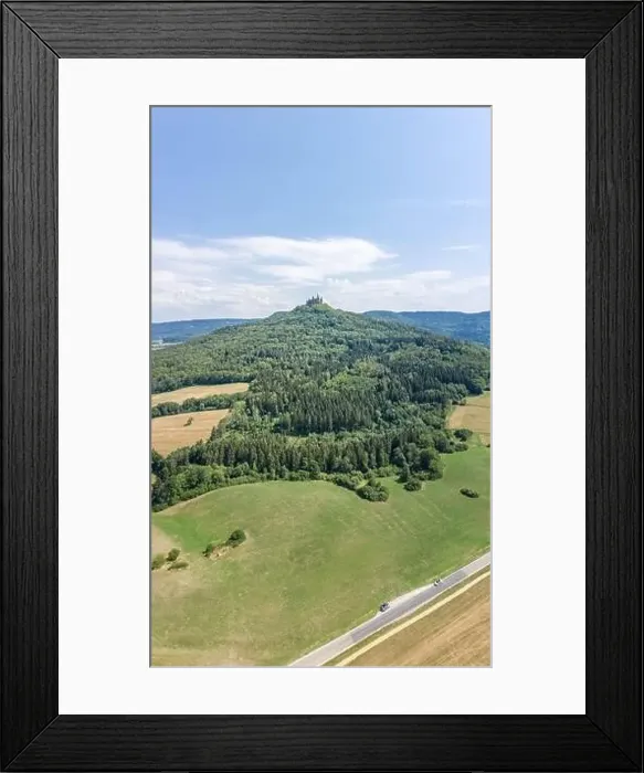 Framed Print : Aerial drone shot of Medival Hohenzollern Castle on hill near Stuttgart at summer noon Framed Print : Aerial drone shot of Medival Hohenzollern Castle on hill near Stuttgart at summer noon