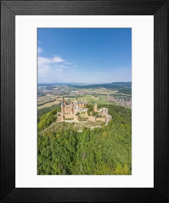 Framed Print : Aerial drone shot of Medival Hohenzollern Castle on hill near Stuttgart at summer noon Framed Print : Aerial drone shot of Medival Hohenzollern Castle on hill near Stuttgart at summer noon
