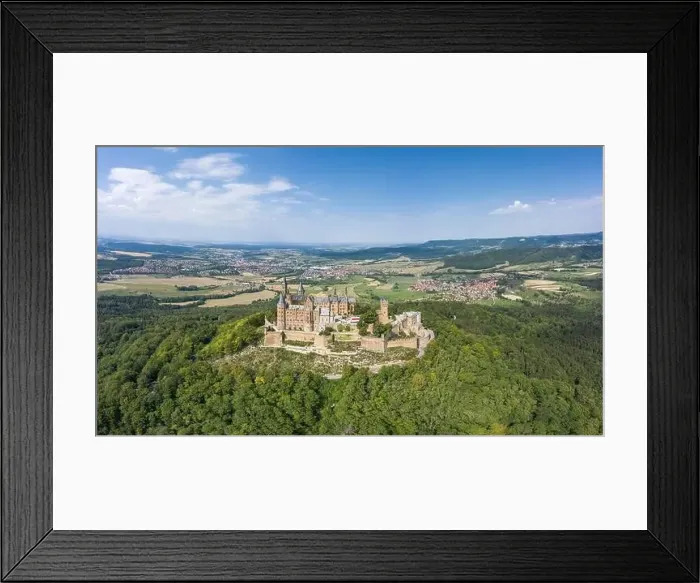 Framed Print : Aerial drone shot of Medival Hohenzollern Castle on hill near Stuttgart at summer noon Framed Print : Aerial drone shot of Medival Hohenzollern Castle on hill near Stuttgart at summer noon