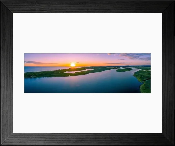 Framed Print : Wide minimalist aerial panorama of sunset over ocean coastline Framed Print : Wide minimalist aerial panorama of sunset over ocean coastline