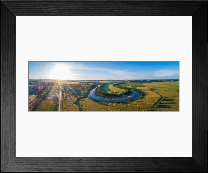 Framed Print : Snowy River bends and Orbost township at sunset - wide aerial panorama