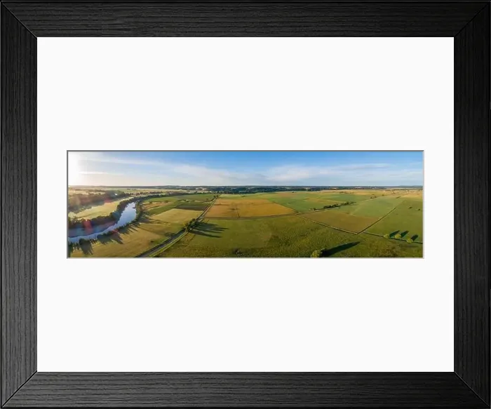 Framed Print : Beautiful aerial panorama of green agricultural fields at sunset in Australia Framed Print : Beautiful aerial panorama of green agricultural fields at sunset in Australia
