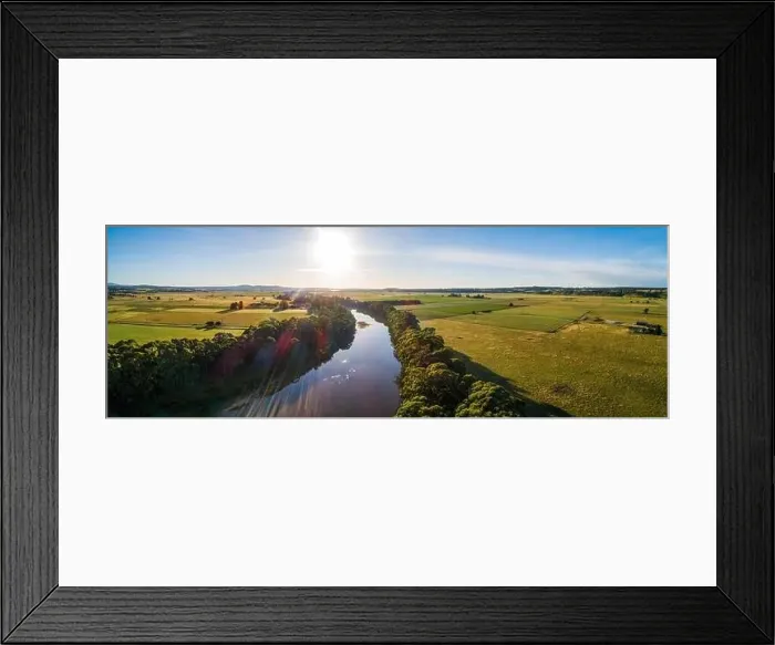 Framed Print : Sun setting over Snowy River bend and green fields - wide aerial panoramic banner Framed Print : Sun setting over Snowy River bend and green fields - wide aerial panoramic banner
