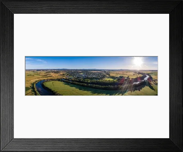 Framed Print : Amazing river bends among green fields and small town in Australian outback at sunset - wide aerial panorama Framed Print : Amazing river bends among green fields and small town in Australian outback at sunset - wide aerial panorama